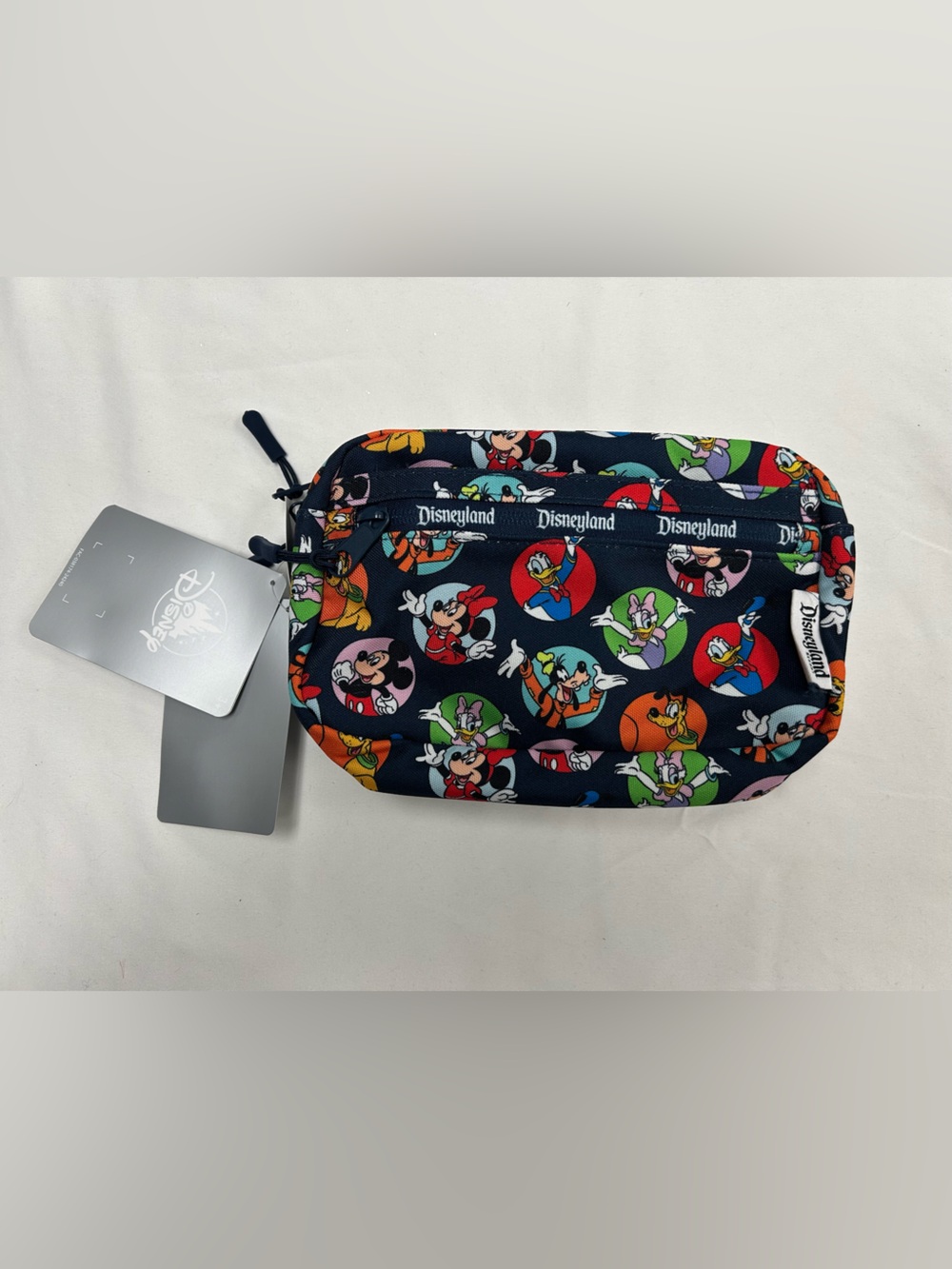 Disney Navy Multicolor Mickey & Friends Circle Belt Bag, built in ear holder
